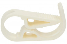 Pinza de plastico para reducir flujo en manguera.